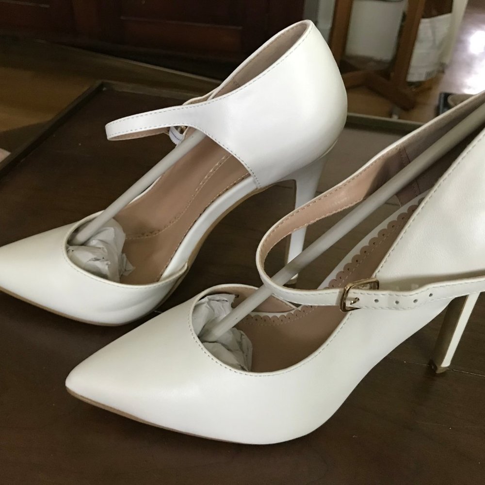 Women's white JC heels